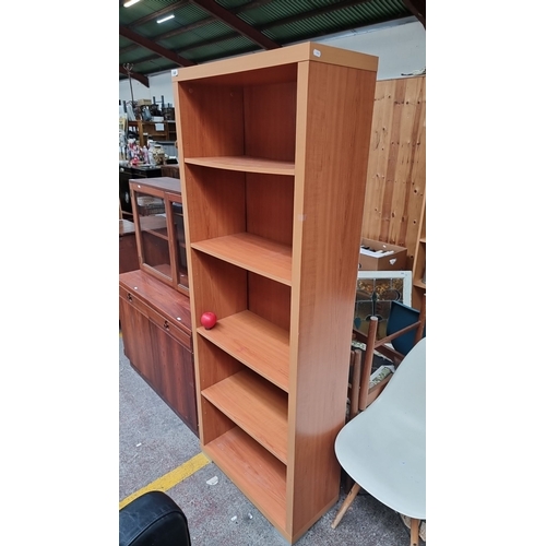 648 - Wooden bookshelf with five adjustable shelves, made from pressboard and laminate, in a light oak col... 