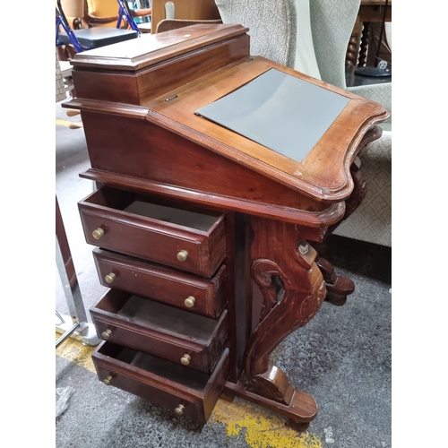 657 - Star Lot : Victorian mahogany writing desk with lift-top revealing multiple small drawers and compar... 