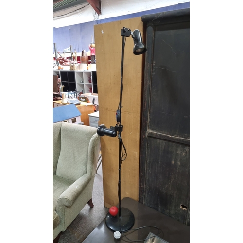 660 - Vintage adjustable metal floor lamp with dual light fixtures and integrated dimmer switch.