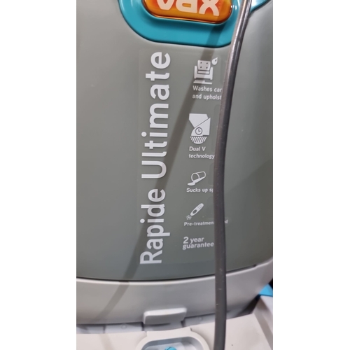 667 - Vax Rapide Ultimate carpet and upholstery washer features Dual V technology and includes a hose atta... 