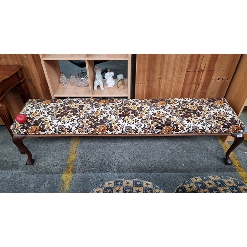 680 - Star lot :  A very long 1930s upholstered bench with floral fabric and claw-and-ball feet. Features ... 