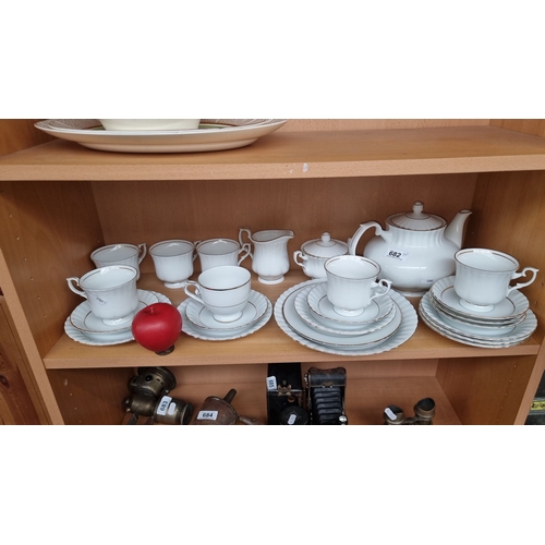 682 - Chodzież porcelain tea set, white with gold trim, includes teapot, creamer, sugar bowl, six teacups ... 