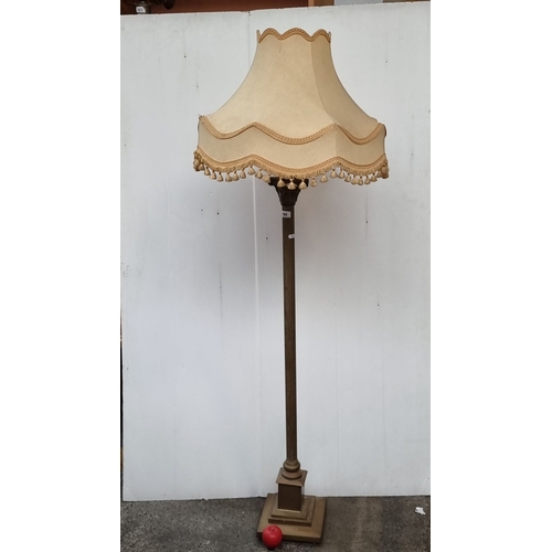 690 - Standing lamp with pleated fabric shade and fringe trim, fluted column, and square pedestal base fro... 