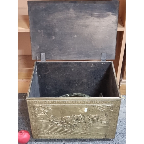 696 - Ornate brass storage box featuring intricate bas-relief scenes of horses and farm life, from the ear... 