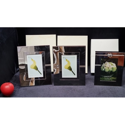 699 - Set of four silver-plated photo frames, including three Belleek Living frames and one Vera Wang by W... 