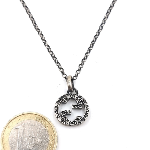 514 - A genuine designer Gucci 925 sterling silver necklace & pendant. Length of necklace - 58 cms.  Weigh... 