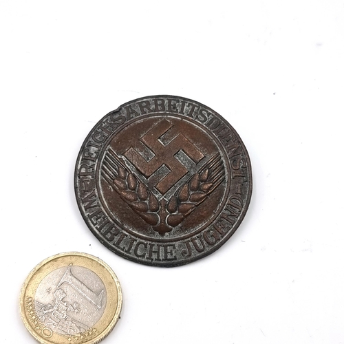 524 - An original WW2 copper RAD, Reichsarbeitsdienst female members badge. Issued to female members of th... 