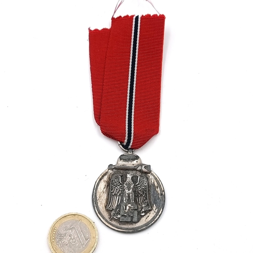 525 - An original WWII Third Reich Medaille 