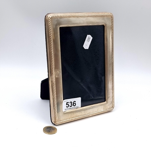 536 - A sterling silver picture frame with hallmarks for Edinburgh 2010. Internal measurements 3.5