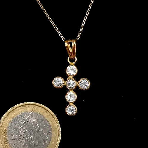 538 - Star lot : A lovely nine carat gold necklace with 18 carat gold cross pendant with gemstones. . Tota... 