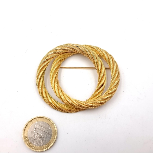 546 - An original vintage designer Christian Dior gold toned rope design brooch. Stamped to back. Pin inta... 