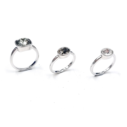 583 - A gorgeous set of three brand new Swarovski crystal rings. Size - R. Comes with care advice & warran... 