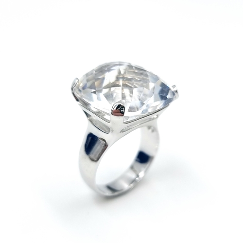 595 - A very large Swarovski crystal cocktail ring. Ring size - R. Comes in original Swarovski box with ce... 