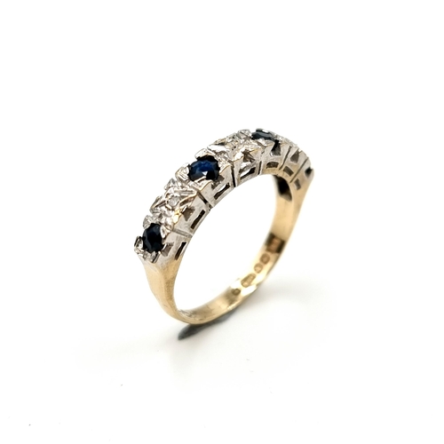 604 - Star Lot : A very attractive diamond and sapphire ring set in nine carat gold. Stamped 375. Size K. ... 