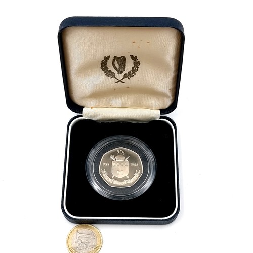 621 - An encapsulated 988-1988 proof centenary Dublin 50p coin. Housed in original presentation case.