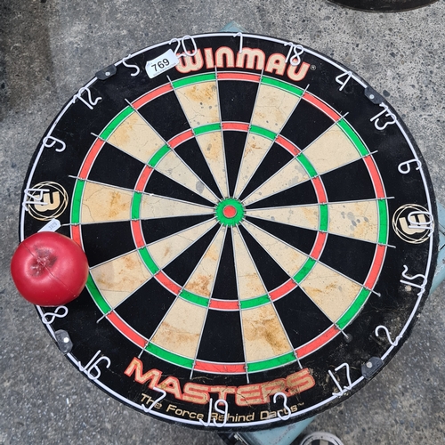 769 - A WINMAU Masters professional dartboard.