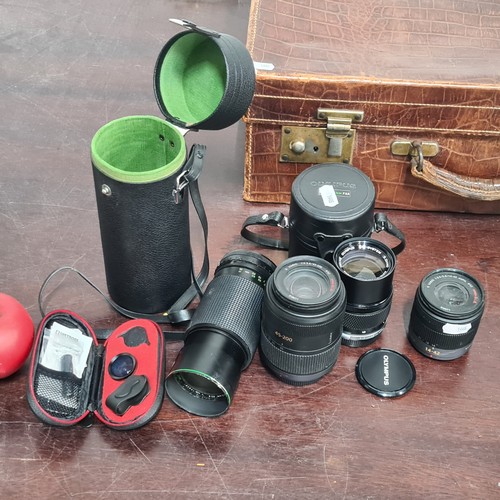 792 - A selection of high quality camera lens equipment including a Olympus example and two Lumix examples... 