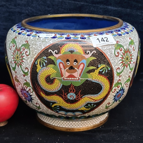 142 - Star Lot : A beautiful large 19th century   Cloisonné bowl. Decorated with three medallions of front... 