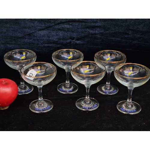 143 - Six nostalgic Babycham coup glasses featuring a gilt gold rim and Babychams deer. All in good condit... 