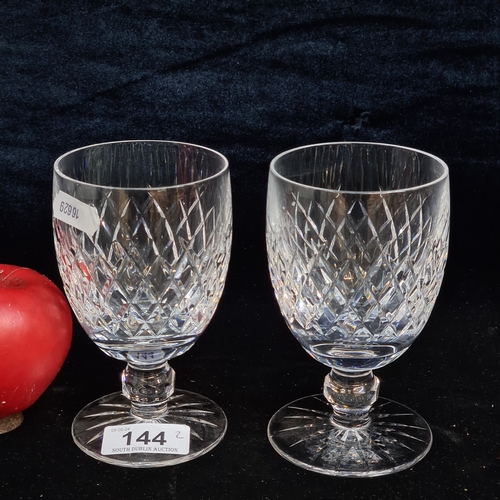 144 - A pair of large Waterford Crystal claret glasses in the Boyne pattern. Both in good condition with a... 