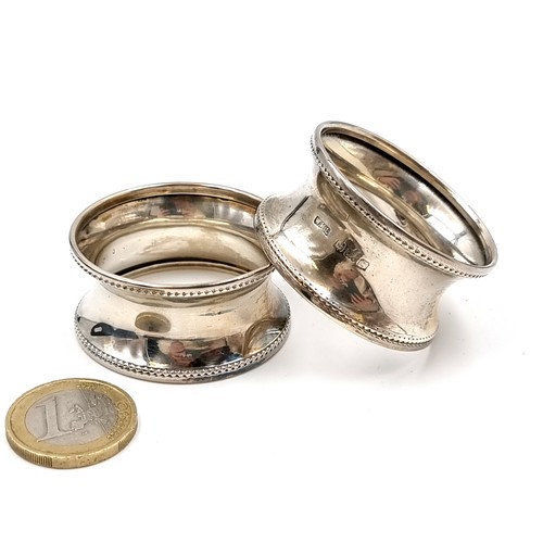 634 - A fabulous vintage pair of sterling silver napkin rings, hallmarks for Birmingham dating to 1942. Ho... 