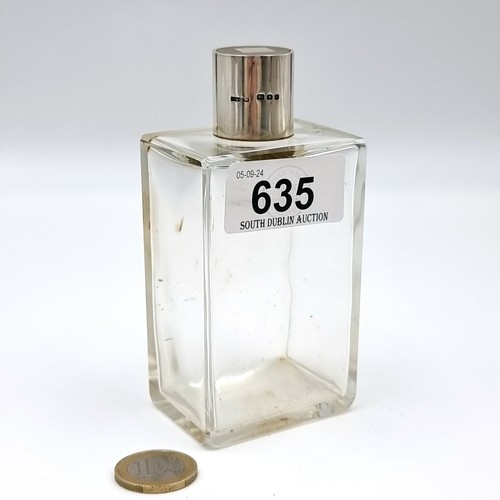 635 - A large vintage gentleman's perfume bottle with sterling silver top lid. Hallmarks for London dating... 