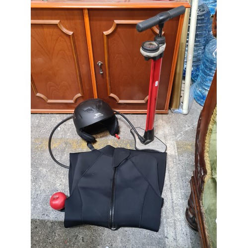 777 - There items including a bicycle pump a tresspass helmet and a full wetsuit size medium