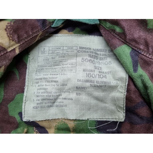 823 - Lot of combat jackets and trousers, including two smocks by Dashmore Clothing Ltd.