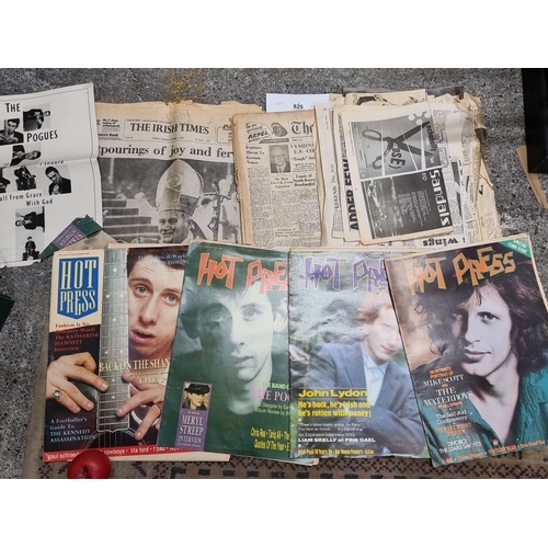 825 - Collection of vintage 'Hot Press' magazines from 1988, alongside an assortment of newspaper clipping... 