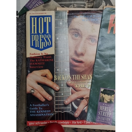 825 - Collection of vintage 'Hot Press' magazines from 1988, alongside an assortment of newspaper clipping... 