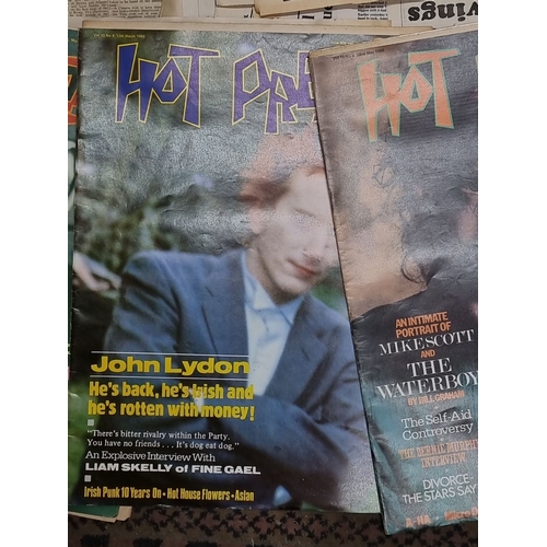 825 - Collection of vintage 'Hot Press' magazines from 1988, alongside an assortment of newspaper clipping... 