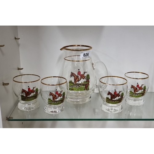 826 - Set of five glassware pieces with gold trim, consisting of one pitcher and four matching tumblers, d... 