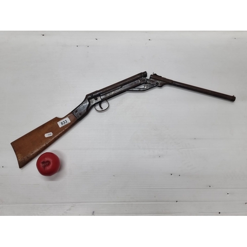 833 - Vintage childs gun featuring a wooden stock and metal barrel. From mid-20th century. Wall hanger onl... 