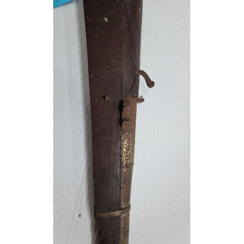 835 - Star lot: An early 1800,s indian dingle matchlock gun. .provenance adams auction house sticker.