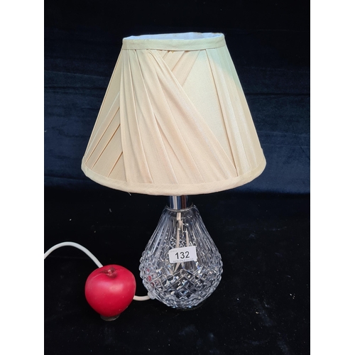 1340 - Star Lot : A beautiful Waterford Crystal table lamp featuring a beige satin shade. In good order wit... 