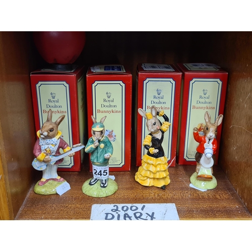 1353 - Four Royal Doulton hand made and hand decorated porcelain Bunnykins figurines. Includes a 1988 Willi... 