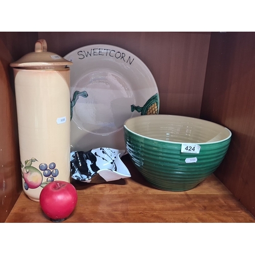 1381 - Mixed lot of four ceramic kitchen items: a tall canister by Hornsea Pottery (Yeovil), a green and cr... 