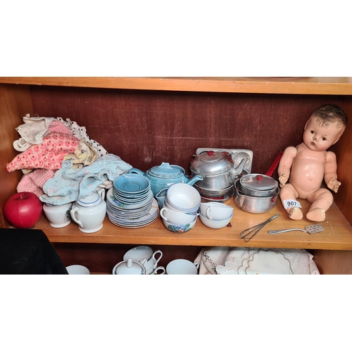 1412 - A mixed lot of charming vintage items including a Dee and Cee Canada,  child's doll, cups and saucer... 