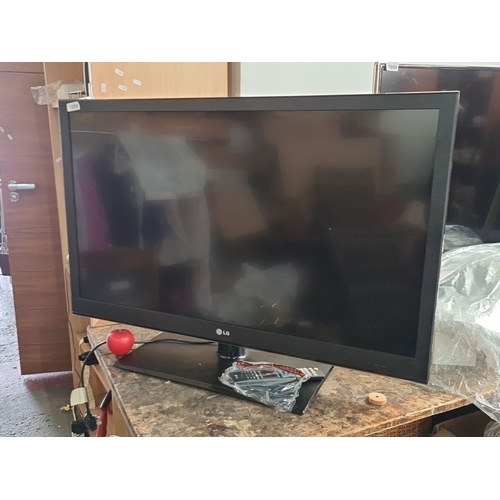 1443 - LG 42LV355T 42-inch LED TV, model 42LV355T-ZC, manufactured in May 2011. Features full HD resolution... 