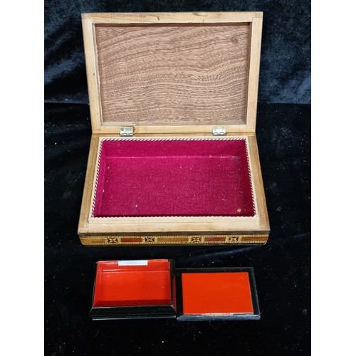 100 - Two vintage boxes including a nice example of a cigar wooden box with a lined interior and colourful... 