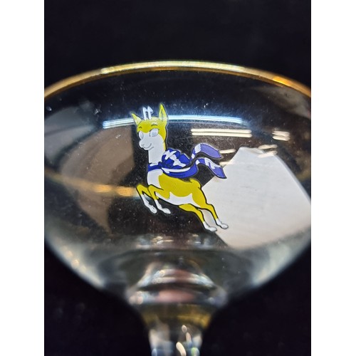 143 - Six nostalgic Babycham coup glasses featuring a gilt gold rim and Babychams deer. All in good condit... 