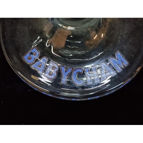 143 - Six nostalgic Babycham coup glasses featuring a gilt gold rim and Babychams deer. All in good condit... 