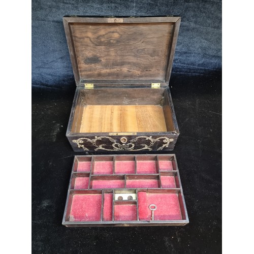 147 - A beautiful example of an antique jewellery box in a dark fruit wood with intricate nlay to top. Wit... 