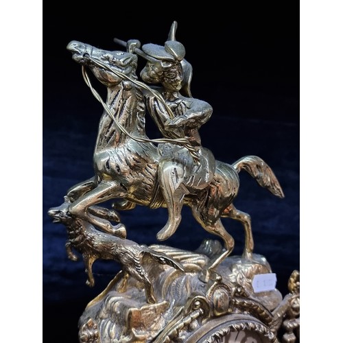 163 - A stunning solid brass neo classical style mantle clock which depicts a young huntsman riding horse ... 