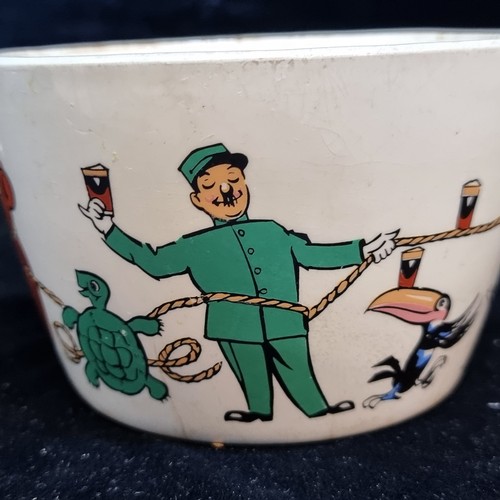 176 - A T. G. Green Gresley Ware pottery pudding bowl produced for Guinness c. 1950's featuring hand paint... 