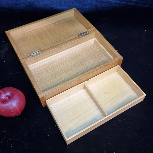 179 - A vintage wooden games box with three separate compartments to interior.