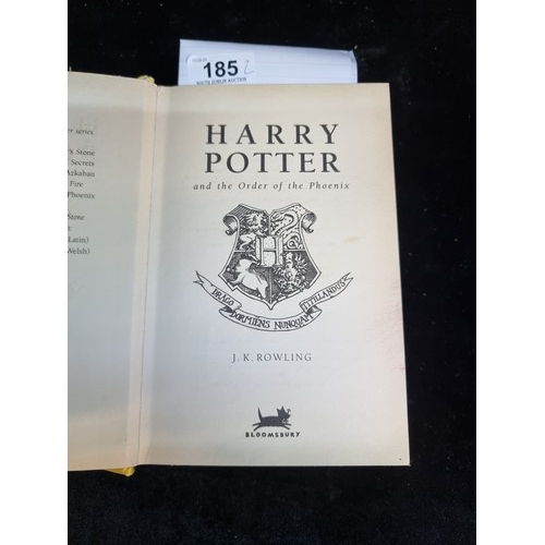 185 - Two hard back First Editions of J. K. Rowlings Harry Potter 