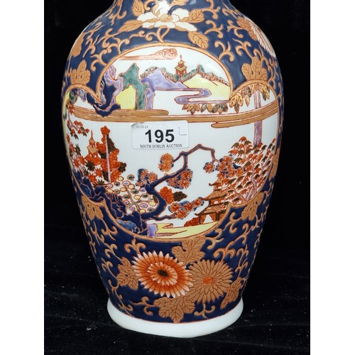 195 - A superb pair of Chinese hand painted raised vases in vibrant tones of blue, red and purple.