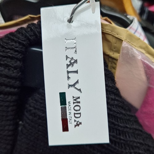 342 - A new with tag 'Italy Moda' poncho. Onesize.
Features a colour palette of reds, blacks and whites.