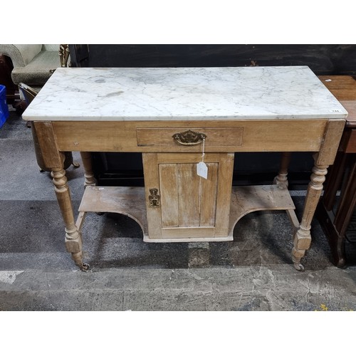 744 - Star Lot : A beautiful antique pine Victorian washstand with solid marble top. Features drawer to ce... 